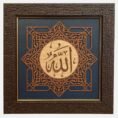 Central Arabic calligraphy: Allah Wooden medallion with geometric star & arabesque details Rich navy blue panel for elegance & depth Textured dark wooden frame with gold accent Ideal for home décor, prayer rooms, offices, and gifting Exclusive design by Floorwalle Decor Dubai